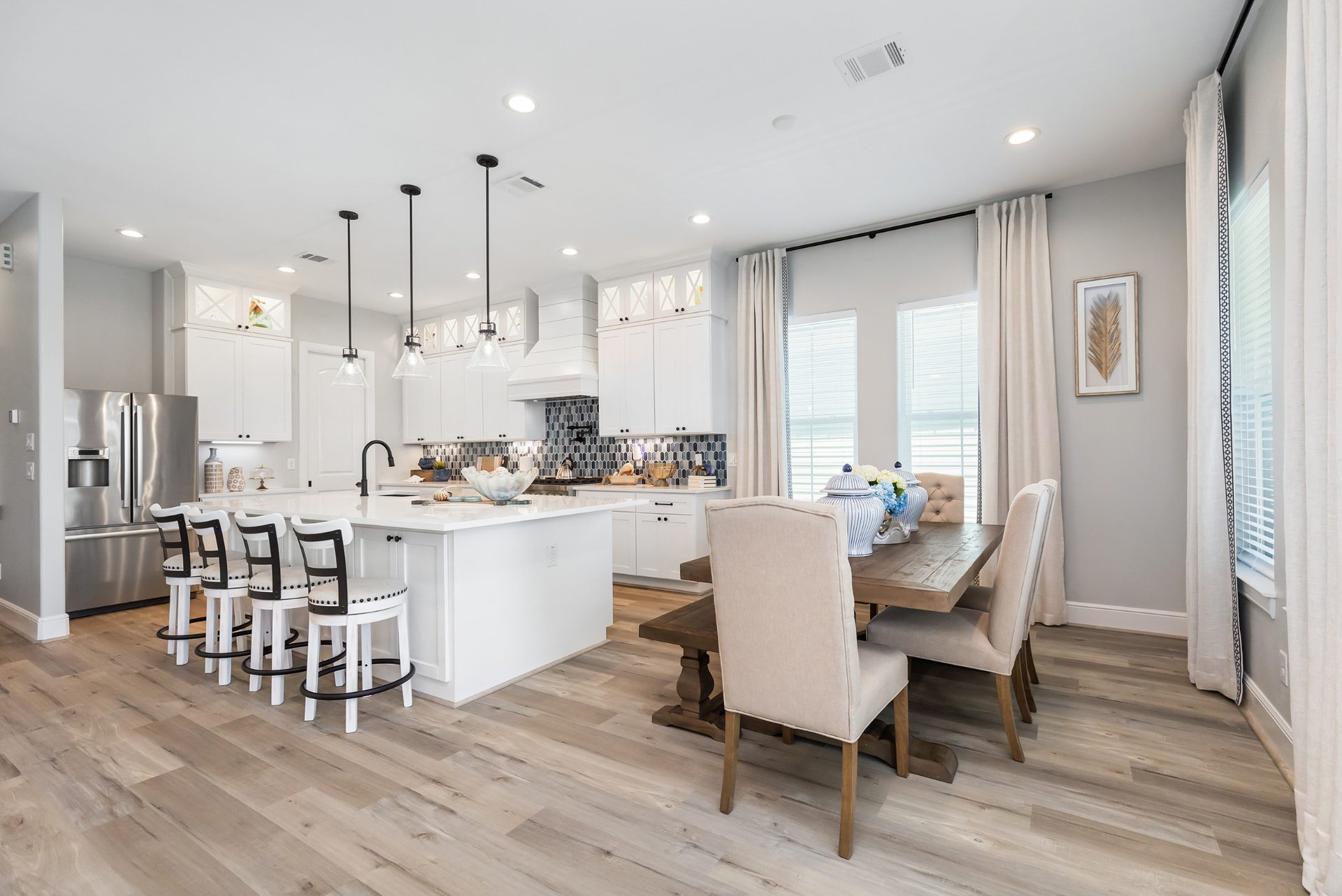 Open kitchen and dining area with island seating