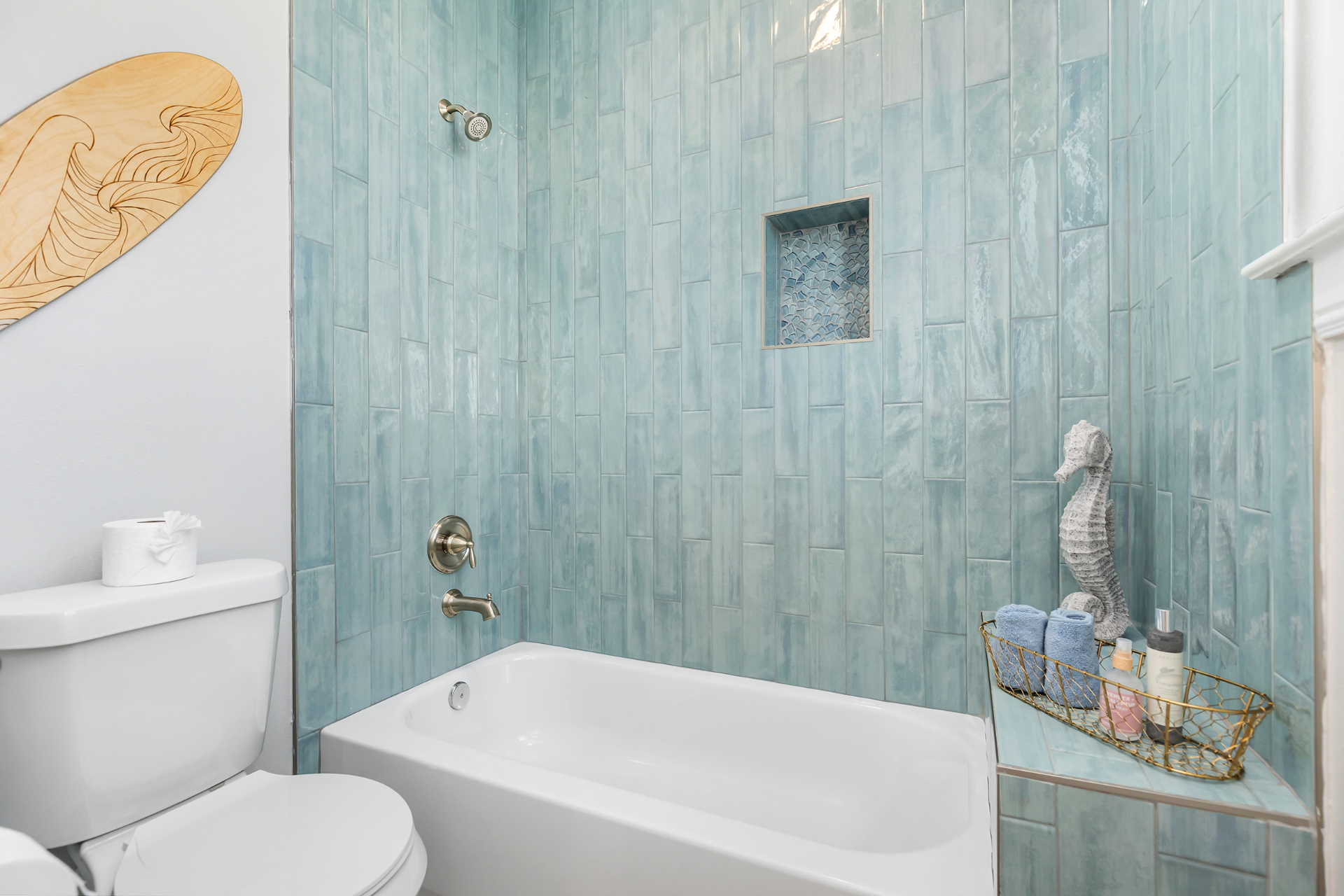 Coastal bathroom with seaglass blue tile